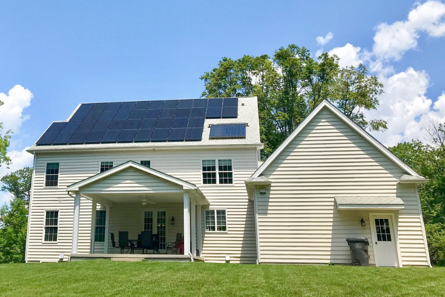 solar array on home with white siding