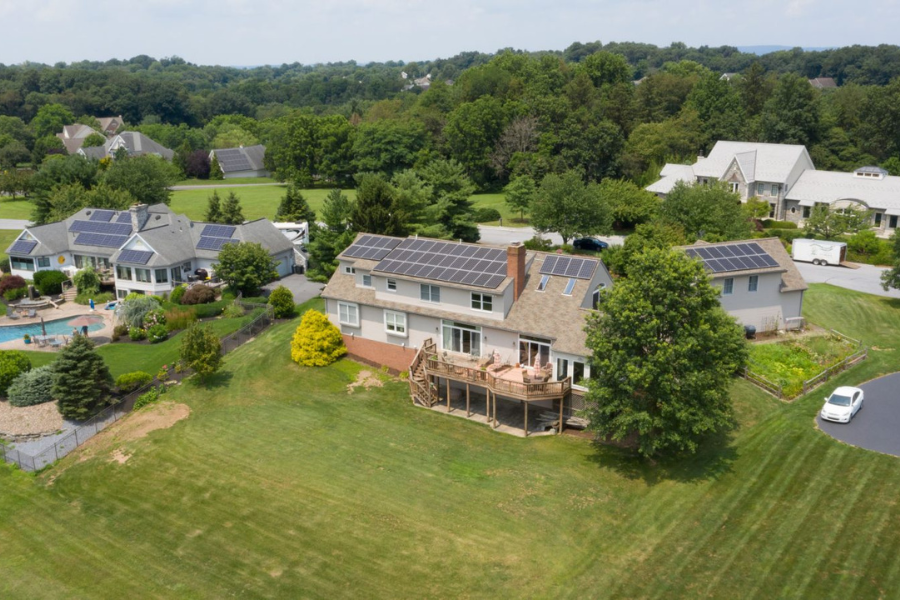 solar panels on roof of large residential property