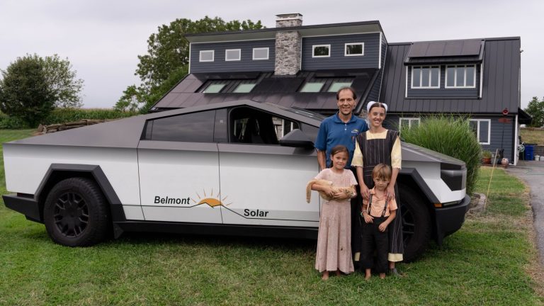 Belmont Solar founder Ben Zook with his family and Cybertruck in front of their home