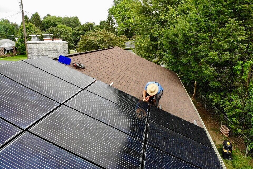 solar panels being installed on roof