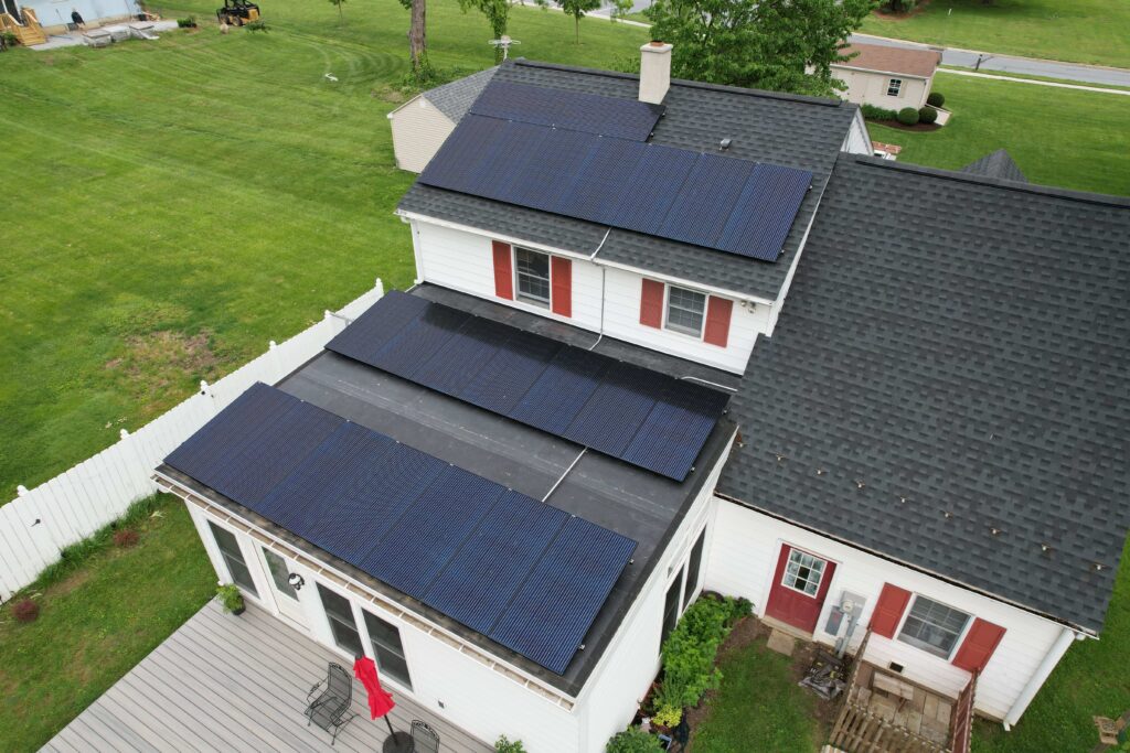 Angled drone image of solar panels recently installed on house in Willow Street, PA