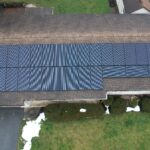 Close up drone shot of installed solar panels on a house roof in Brownstown, PA