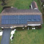Drone shot of installed solar panels on a house roof in Brownstown, PA