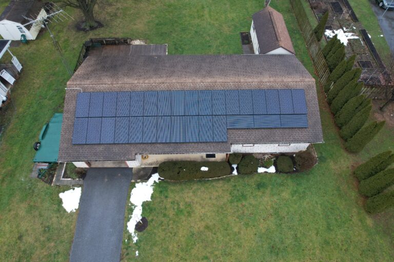 Drone shot of installed solar panels on a house roof in Brownstown, PA