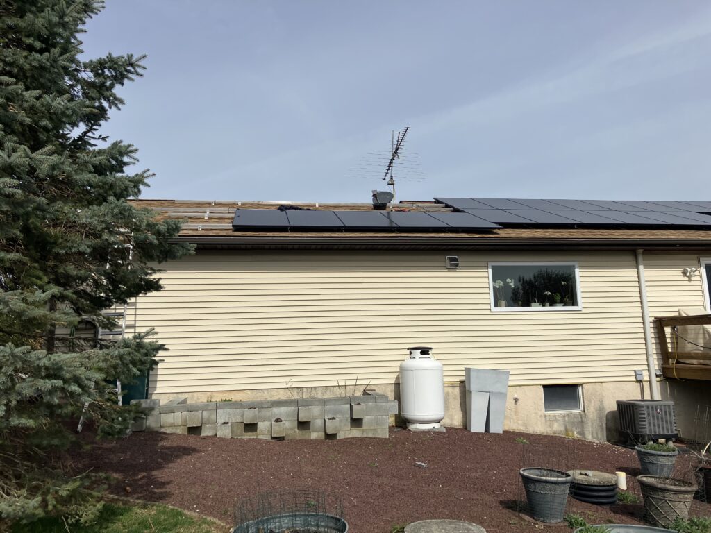 a photo of the roof mid solar panel instal by Belmont Solar in Quarryville, PA