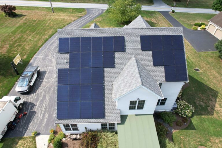 solar panels on both sides of a roof of a house installed by a solar installer in denver pa