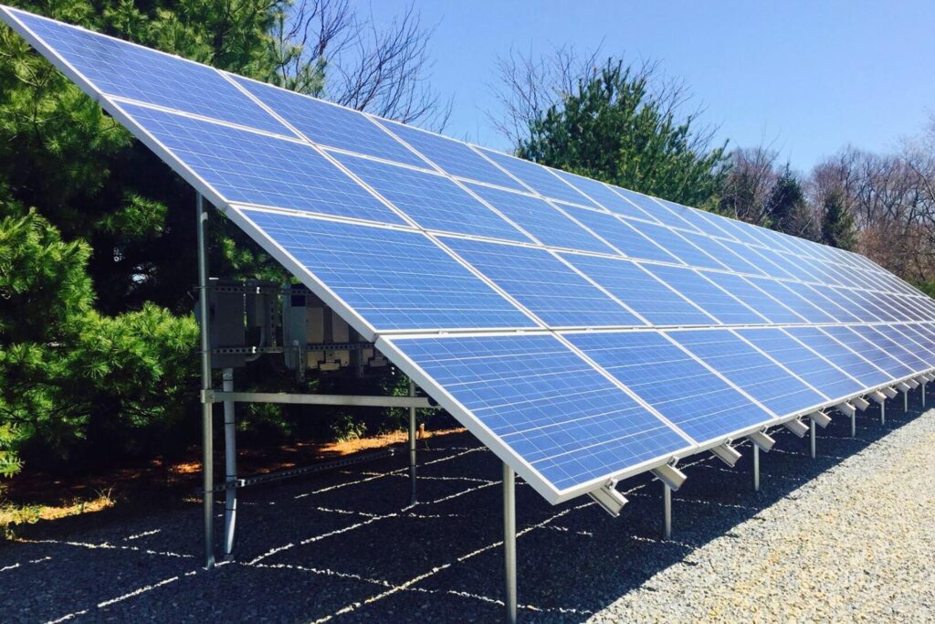 Solar Panels in the Sun, image used to discuss Solar Rebates including cost of saving electricity