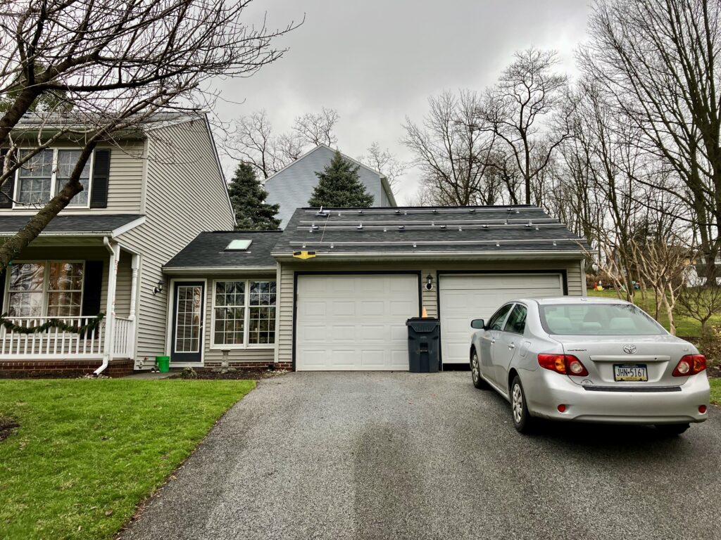 driveway of a home with a newly installed solar system