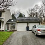 driveway of a home with a newly installed solar system